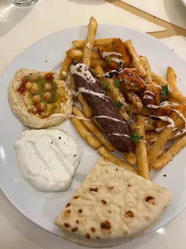 Chicken shawarma wrap with garlic sauce at Zaytoon Restaurant Winnipeg