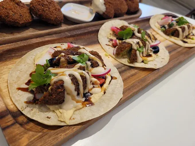 Baba ghanouj with pomegranate and fresh pita at Zaytoon Mediterranean restaurant Winnipeg