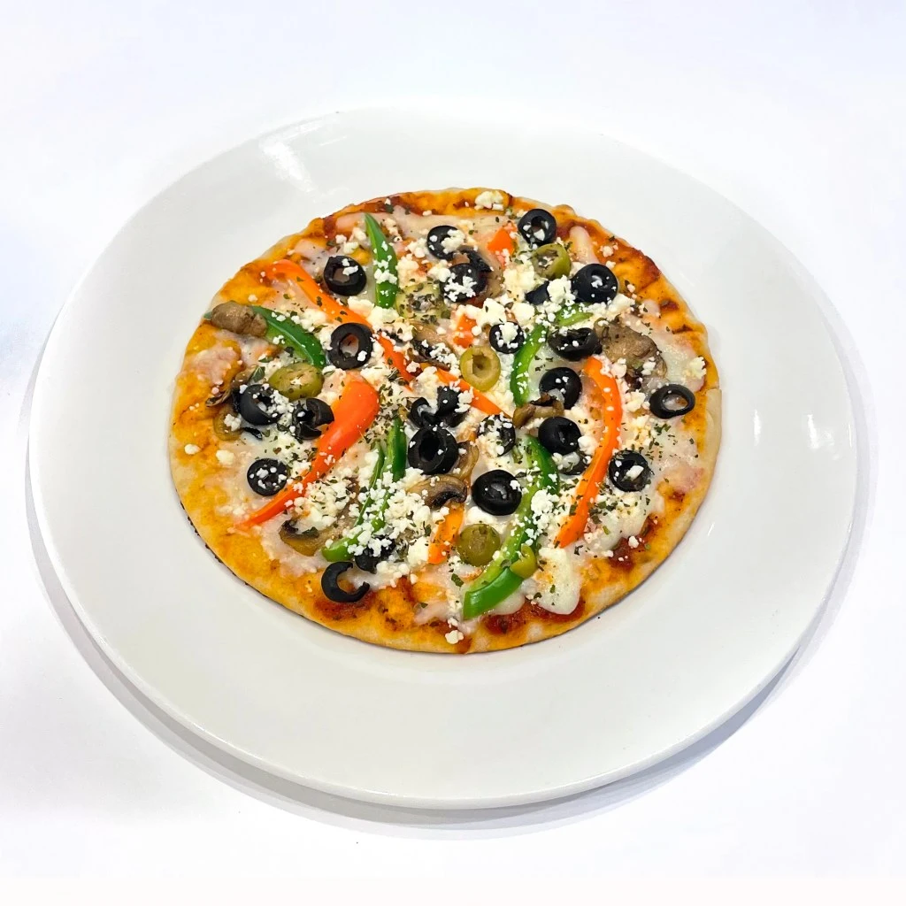 Meddi Fatayer at Zaytoon Restaurant Winnipeg — traditional baked pastries with meat or spinach